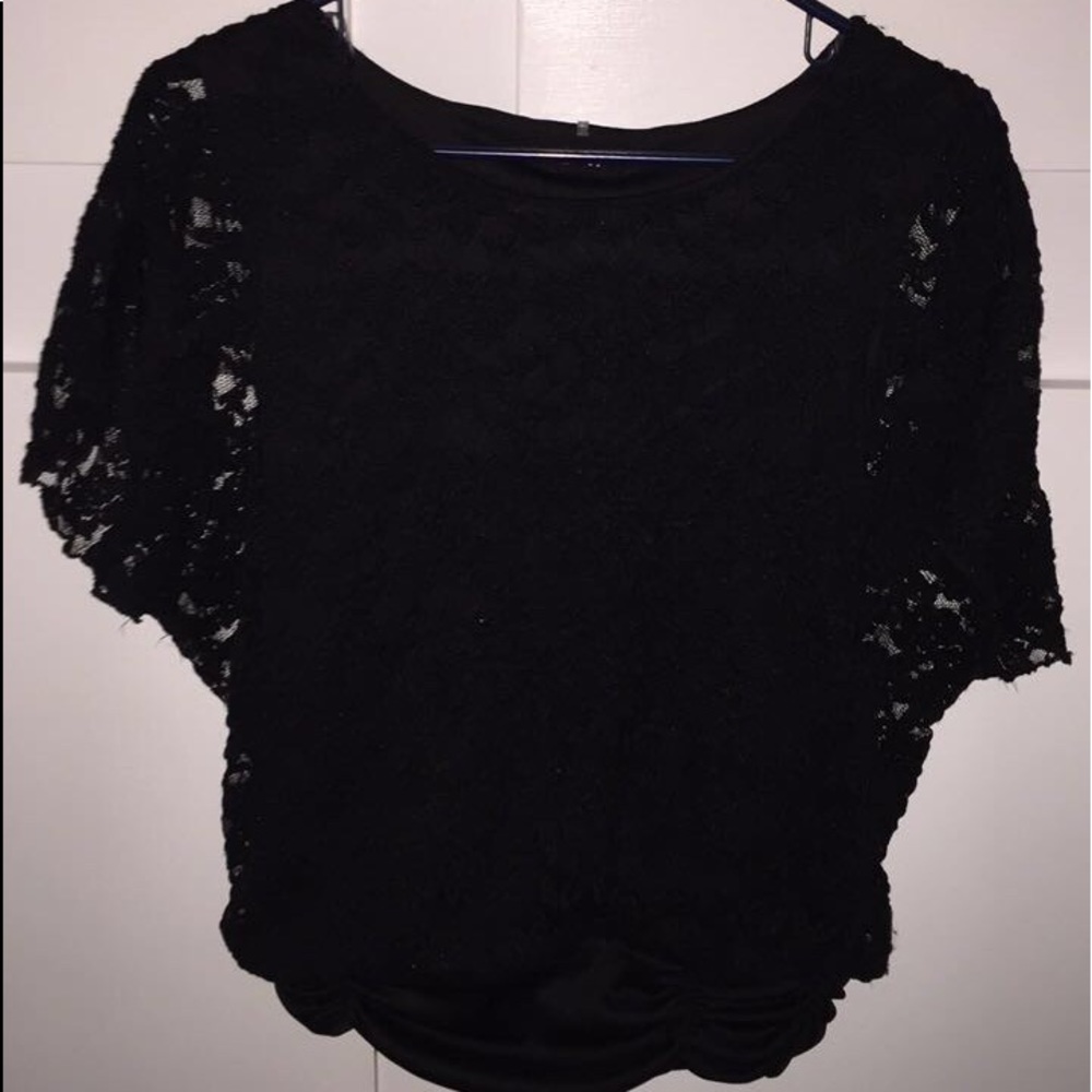 A black lace shirt